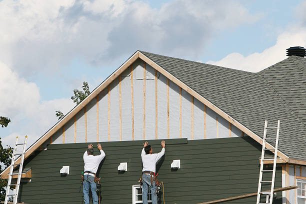 Professional Siding technician working in Katy, TX